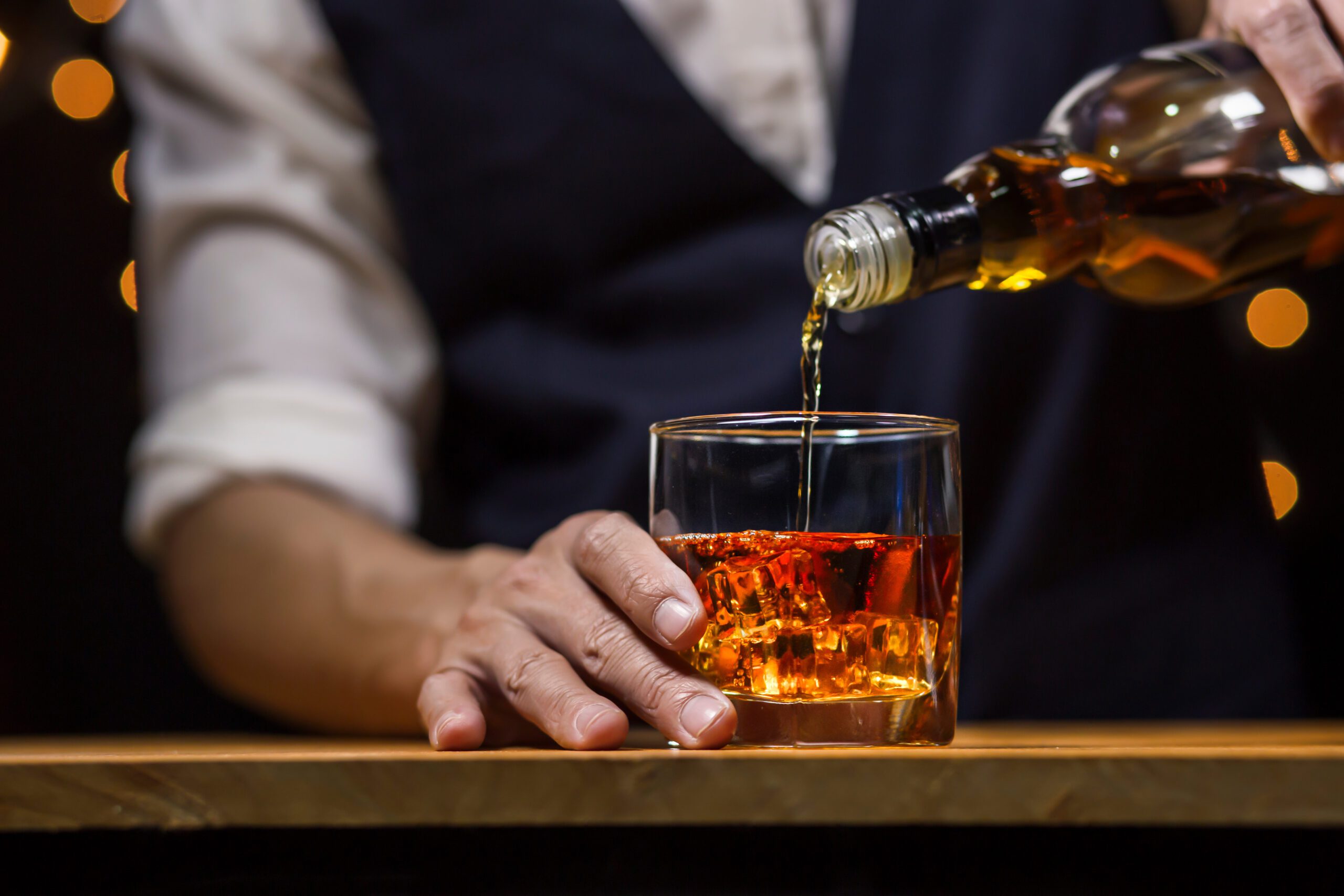 Bartender Serve Whiskey, on wood bar,